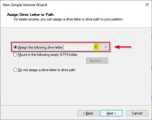 Assign a letter to the new drive (letter E in the example) and click Next
