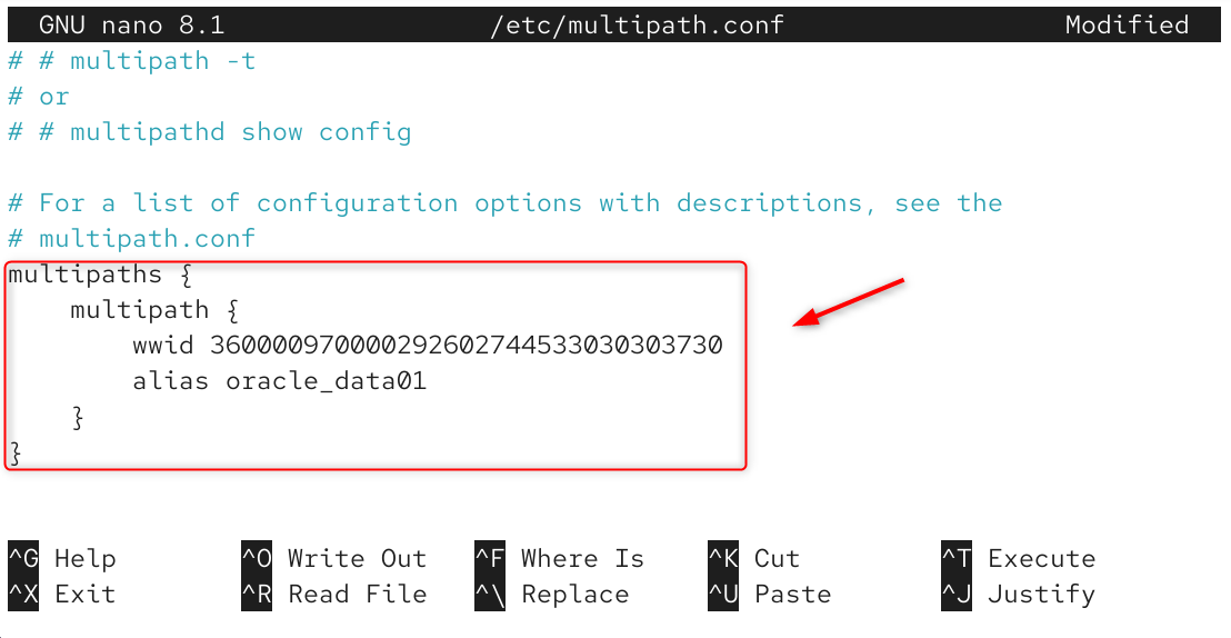 Nano editor showing a WWID-to-alias entry in multipath.conf- img Nano editor showing a WWID-to-alias entry in multipath.conf